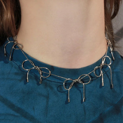 MARLAND BACKUS BOW NECKLACE